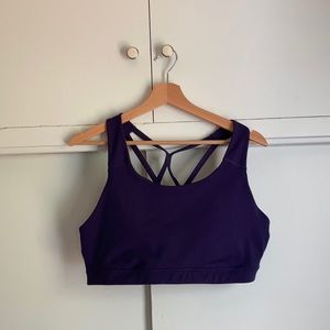 Purple strappy sports bra